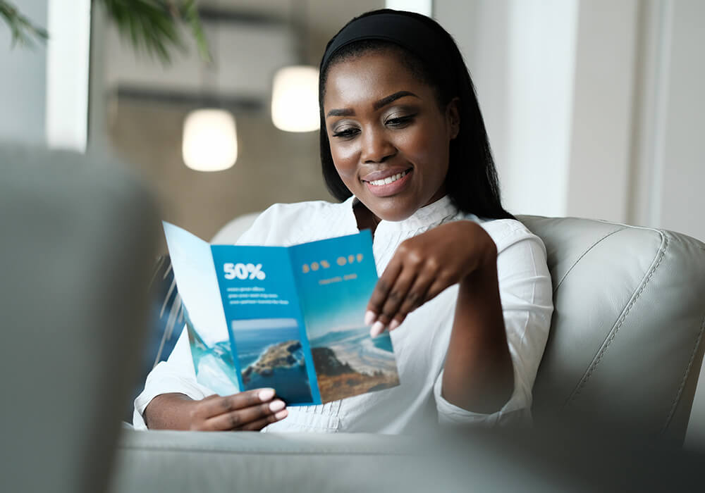 Woman holding a businesses brochure