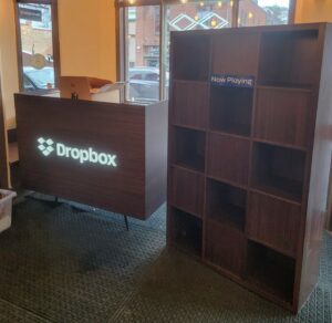 A dimensional display for Dropbox to show new and upcoming products, and a podium featuring a custom LED Dropbox logo.